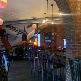 a woman sitting at a bar