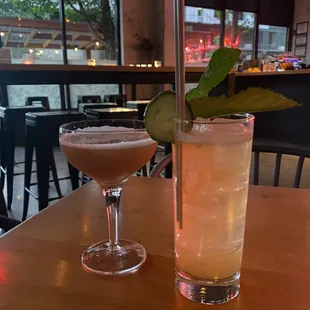 two cocktails on a table