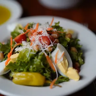 a salad on a white plate