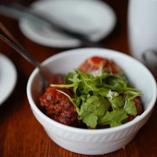 a bowl of food on a table