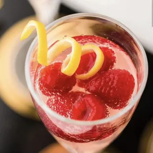 raspberries in a martini glass
