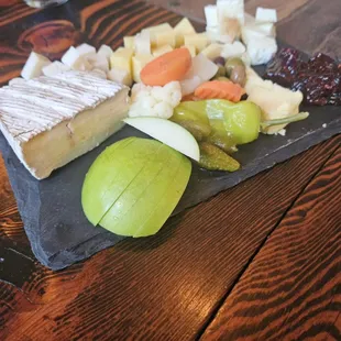 a variety of cheese and fruit