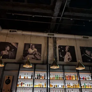 Paintings/photos above the bar
