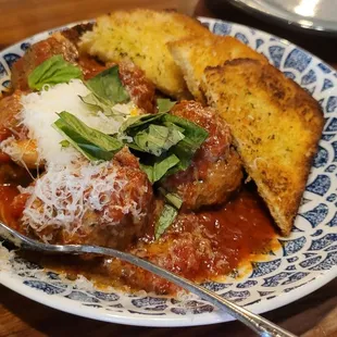 Roasted meatballs with ricotta, basil, polenta bread.  Very good dish.