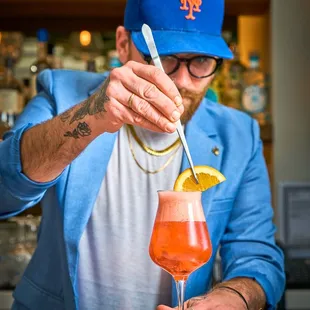 Refreshing Aperol Spritz at Bar Sprezzatura Year-Round Rooftop Cocktail Bar &amp; Italian Restaurant