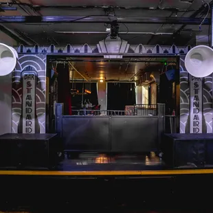 a stage with speakers and lights