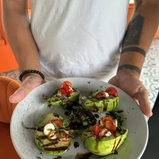 a man holding a plate of food