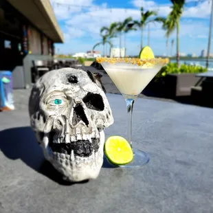 a skull and a cocktail