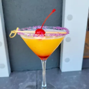 a cocktail in a martini glass