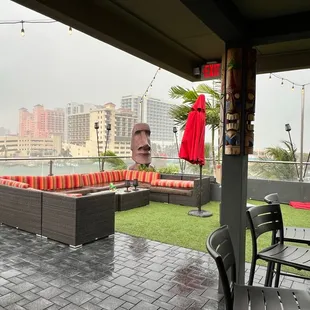 a patio with a view of the city