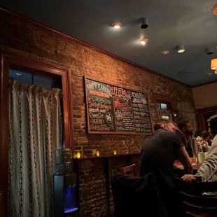 people sitting at the bar