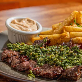Skirt steak and fries with chimichurri