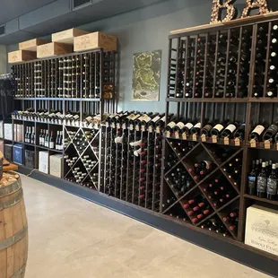a wine cellar with a christmas tree in the background