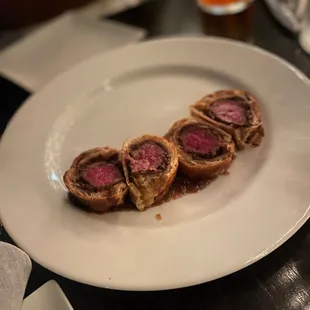 a plate of meatloafs on a table