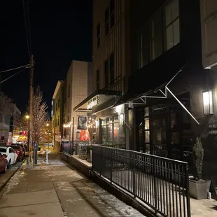 a view of a street at night