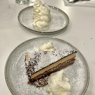 two plates of dessert on a table