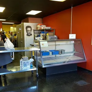 a woman behind the counter