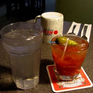 a drink and a beverage on a table