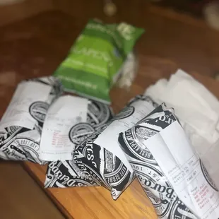 a bara deli sandwich wrapped in paper