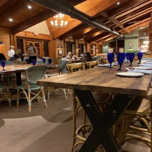 a dining room with tables and chairs