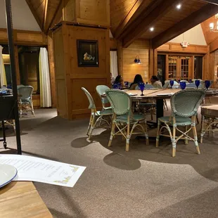 people sitting at a table in a restaurant