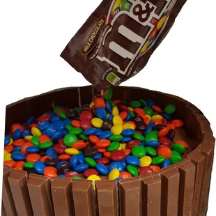 Pour on the M&amp;M's Cake