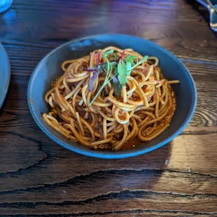 Fideo - like a side of spaghetti but with a distinctly Mexican spicy sauce. They toast the noodles then cook em in the sauce (not water)!