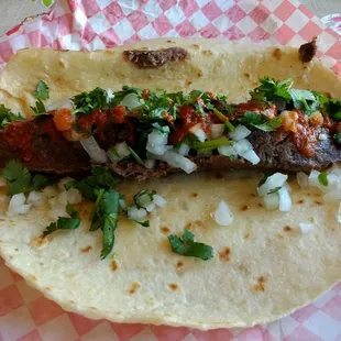 The best Barbacoa in town!  Really flavorful and moist.  Just made fresh taste.  Not greasy or oily at all.  Homemade tortillas and salsa!