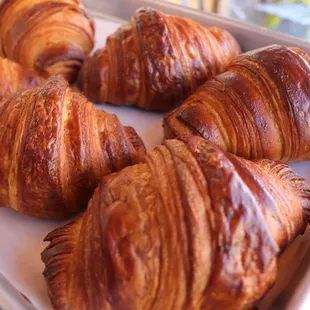 a tray of freshly baked croissants