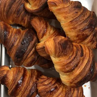 a tray of freshly baked croissants