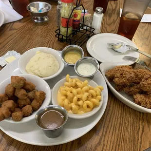 chicken tenders, mashed potatoes, mac and cheese, fried okra