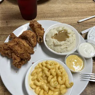 chicken tenders, mashed potatoes and gravy, mac and cheese