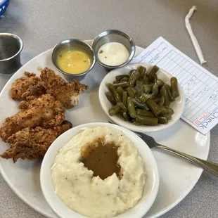 chicken tenders, mashed potatoes and gravy, green beans