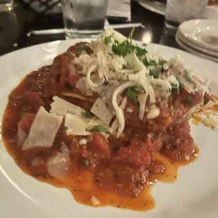 Lasagna buried under the sauce