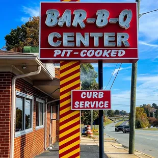 a sign for a bbq