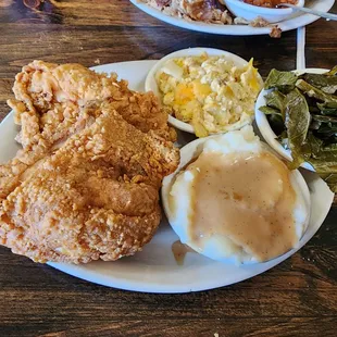 Fried chicken breast special with three sides of your choice (I chose greens, mashed potatoes  with gravy, and squash casserole).