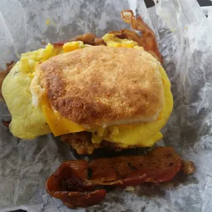 Fried tenderloin, bacon, egg and cheese breakfast biscuit.