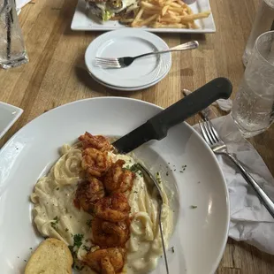 Fettuccine Alfredo add shrimp and 1/2 pound Barbie burger with fries.