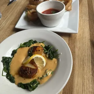 Scallops Rockefeller and garlic Parmesan rings