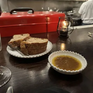 Bread and olive oil with olives
