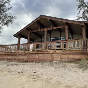 Front of 3bedroom cottage.  Right on beach.