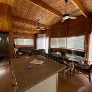 Living room/dining table view from the kitchen side.