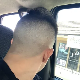 Don't waste money here, this what a 35$ haircut gets you. Asked for a mid fade with a trim on top and got this.
