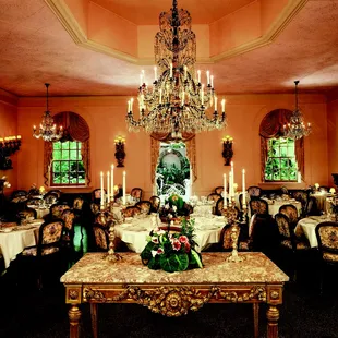 a fancy dining room with a chandelier