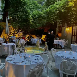 tables and chairs set for a formal event