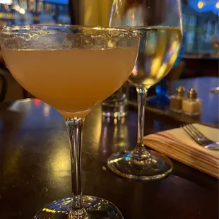 two glasses of wine on a table