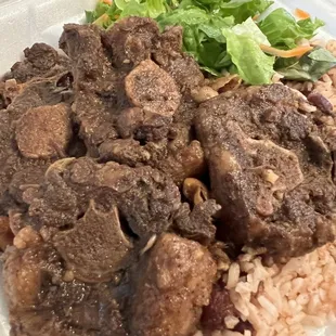 Oxtail and Rice and Peas! Delicious and generous portions! Big Fan