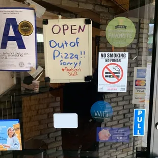 a sign in the window