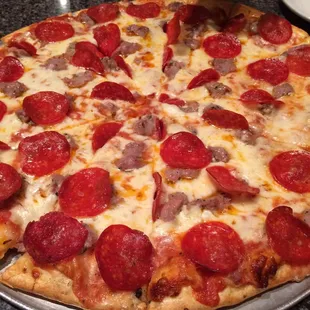 14" pepperoni and sausage pizza.