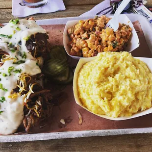Pulled pork biscuits and gravy with homemade grits and Mexican corn salad